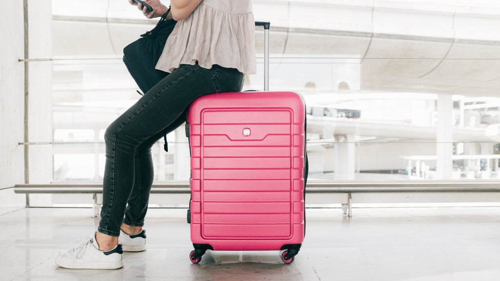 the ultimate guide to travel luggage for women blog banner